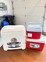 All three coolers side by side for scale and identification