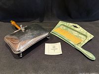 Silent butler, dustpan and brush grouped