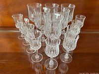 Fifteen crystal stemware pieces grouped together showing pattern and counts