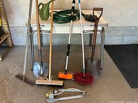 Full lot: shovels, rake, broom, scrub brushes, sprinkler, hose, watering can, gloves
