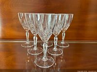 All six crystal stemmed wine glasses grouped together