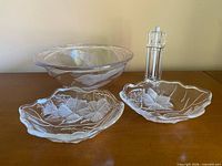 Overall lot showing serving bowl, two leaf dishes, acrylic mill