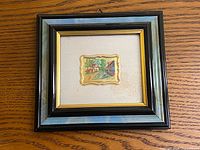 Front view of framed miniature artwork