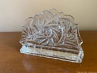 Front view showing Pinwheel cut pattern and scalloped rim