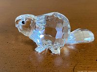 Left profile of faceted crystal beaver figurine