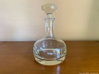 Front view of Tarnow clear glass decanter with stopper