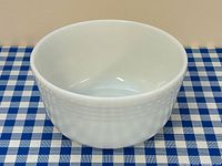 Top view of white ribbed milk glass mixing bowl