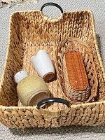 Overall lot showing basket, two vases, nested wicker trays