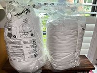 two sealed duvet inserts side by side