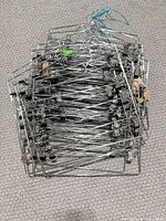 Stack of metal clip hangers