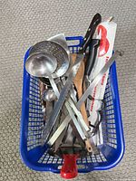 Basket view showing all utensils and knives