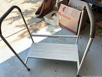 Front view of Step2Bed transfer step showing platform and side handles