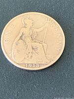 Close-up of reverse showing seated Britannia and date 1913
