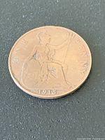 Reverse side of 1915 penny showing seated Britannia and date