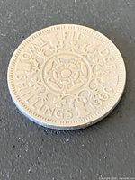 Reverse of coin showing Tudor rose design and date