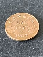 Reverse side showing CANADA ONE CENT 1929 with maple leaves