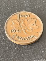 Reverse of 1941 Canada one-cent coin showing maple leaf design