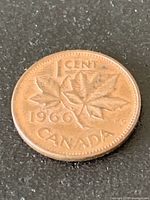 reverse side showing date 1966 and maple leaves