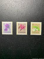 Front view of the three stamps side by side