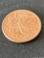 Reverse showing maple leaf twig, date 1979