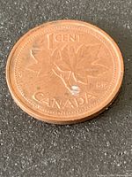 Reverse maple-leaf design with 1 CENT and CANADA legends