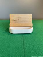 Front view of ceramic base with wood backrest
