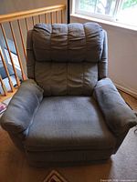 Front view of Action Lane blue fabric recliner chair