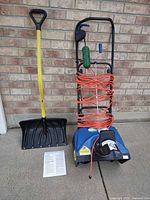 Snow thrower, shovel, cord, manual