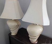 Both lamps with shades displayed side by side