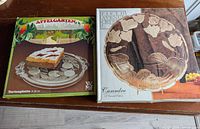Both product boxes: WMF Apfelgarten and Fifth Avenue Crystal Cassandra