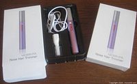 Front view showing opened package contents and sealed box