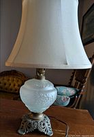 Full view of lamp with shade displaying overall design