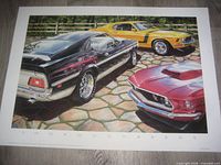 Front view of entire poster showing three Mustangs