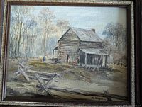 Full view of framed painting showing cabin scene