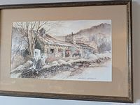 Framed print hanging, full view with frame and mat