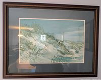 Front view of framed print under glass
