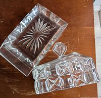 Butter dish base and lid separated to show patterns