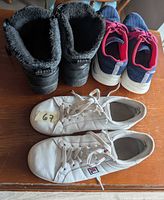 top view of all three footwear pairs