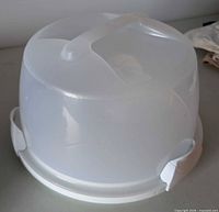 cake carrier assembled showing lid handle and side clamps