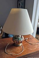 Lamp with shade assembled, power cord visible