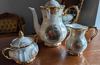Teapot, creamer, sugar bowl grouped