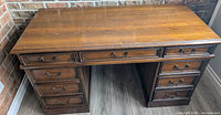 Full view of the seven-drawer wooden desk