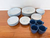 All pieces grouped: plates, bowls, mugs