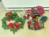 Group shot showing wreath, garland, centerpiece basket, potted poinsettia and string lights