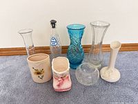 Group overview showing all eight glass and ceramic pieces