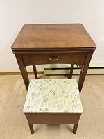 Cabinet front view with bench tucked underneath