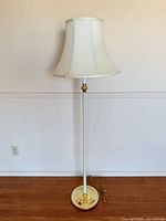Full view of floor lamp with shade