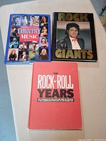 Front covers of three hardcover music books