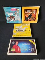 Four boxed music sets front covers