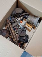 Boxed view showing assorted vintage tools stacked together